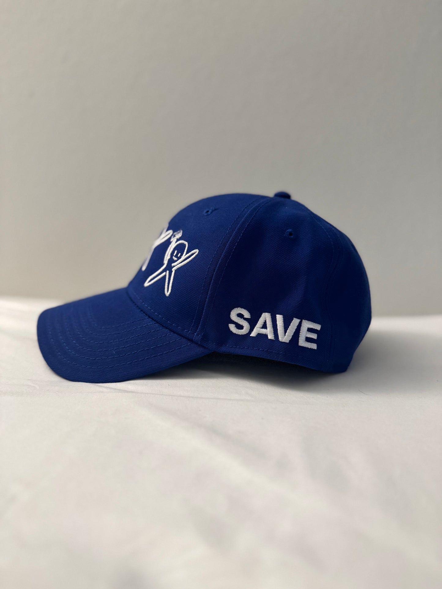 Blue Cap “white logo”