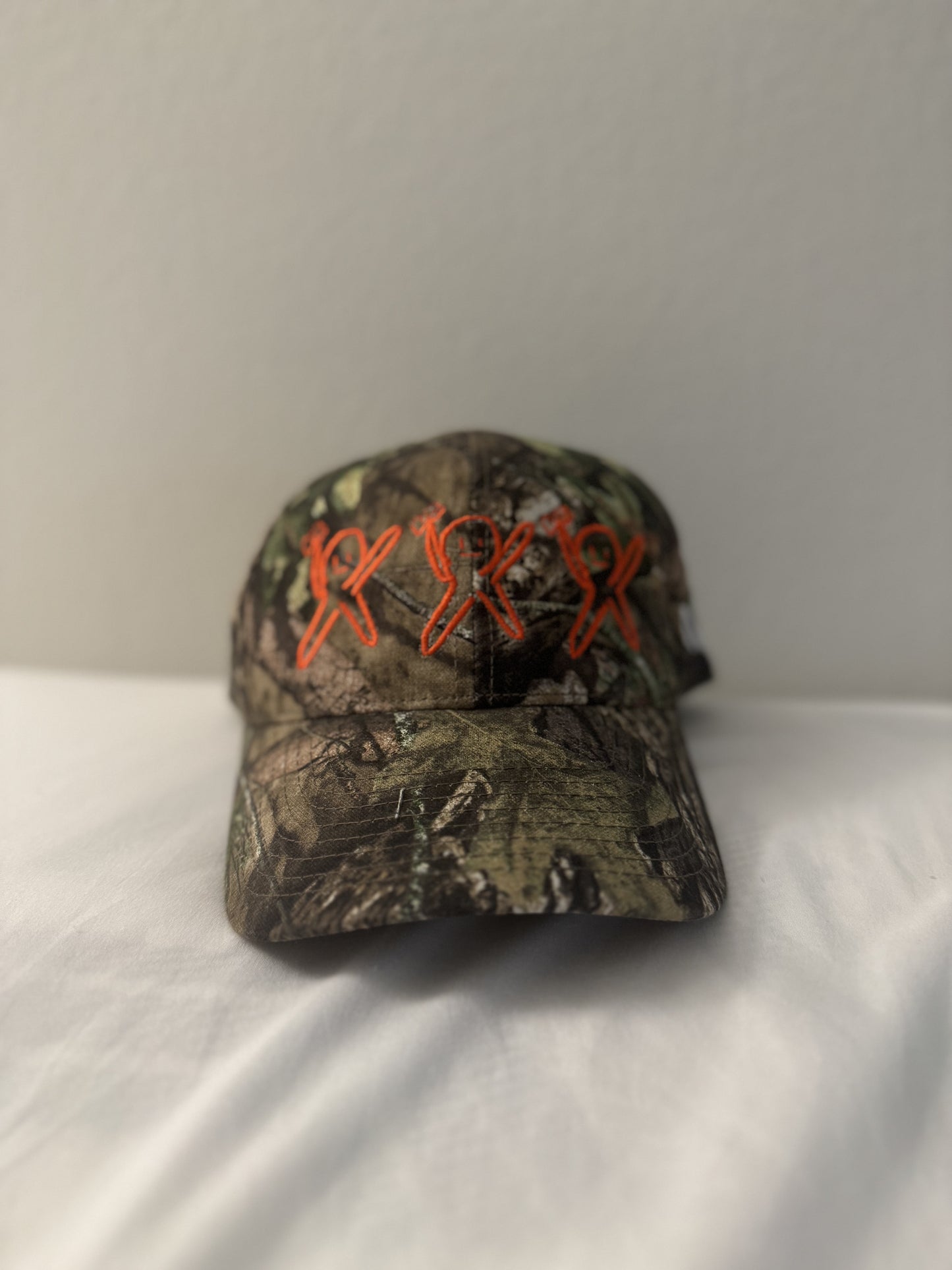 Camo Cap “Orange Logo”